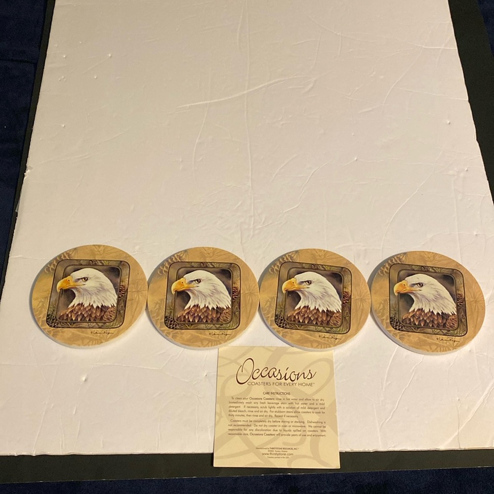 2 sets of Coasters 4 in each box, never used.